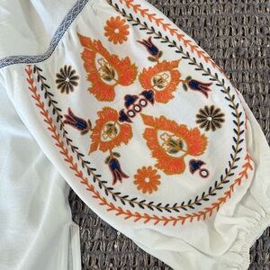 Embroidered White Blouse with Orange Accents